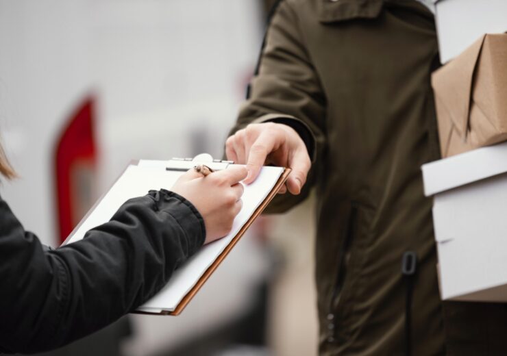 close-up-signing-package-delivery